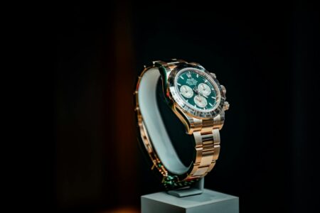 Close-up of an elegant luxury watch on a wrist showing traditional craftsmanship