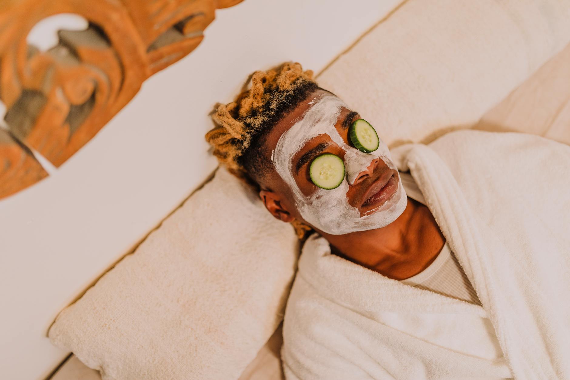 Professional esthetician performing facial treatment in clean spa environment