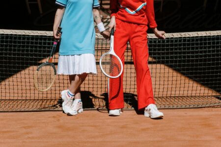 How Pickleball Uniforms Became Country Club’s Latest Fashion Statement Athletic wear displayed on tennis court showing coordinated sports clothing and accessories