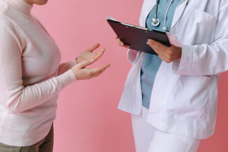 Professional medical consultation discussing cosmetic procedure options