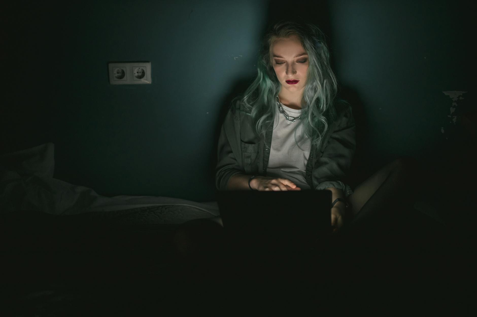 Professional woman working from home on laptop in comfortable attire