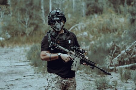 Close-up of modern tactical vest showing multiple pockets and organizational features