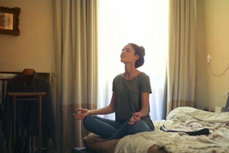 Serene corporate meditation room with neutral colors and minimal furniture