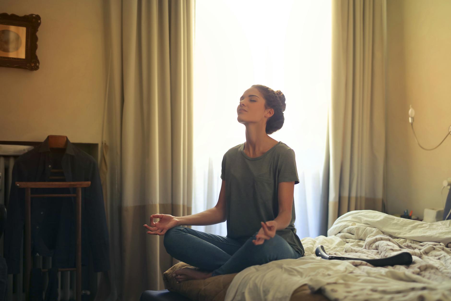 Serene corporate meditation room with neutral colors and minimal furniture
