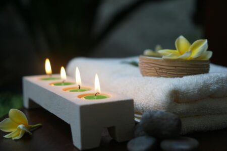 Professional spa treatment room with massage table and wellness equipment