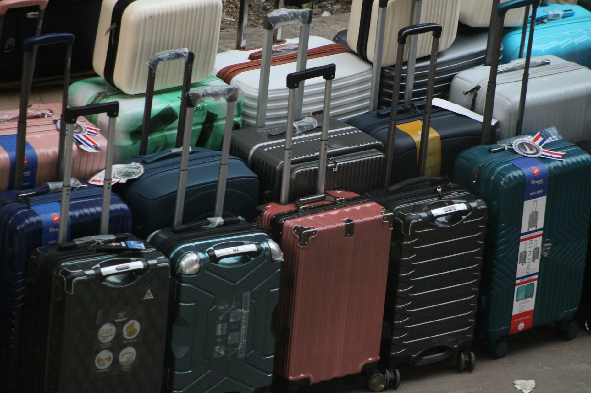 Open suitcase with neatly packed clothing items demonstrating efficient travel packing