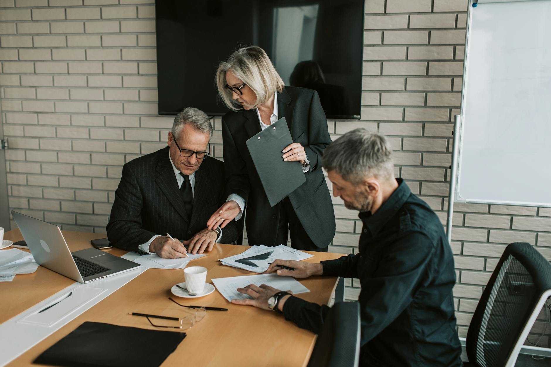 Professional consultation meeting showing contemporary business attire and communication