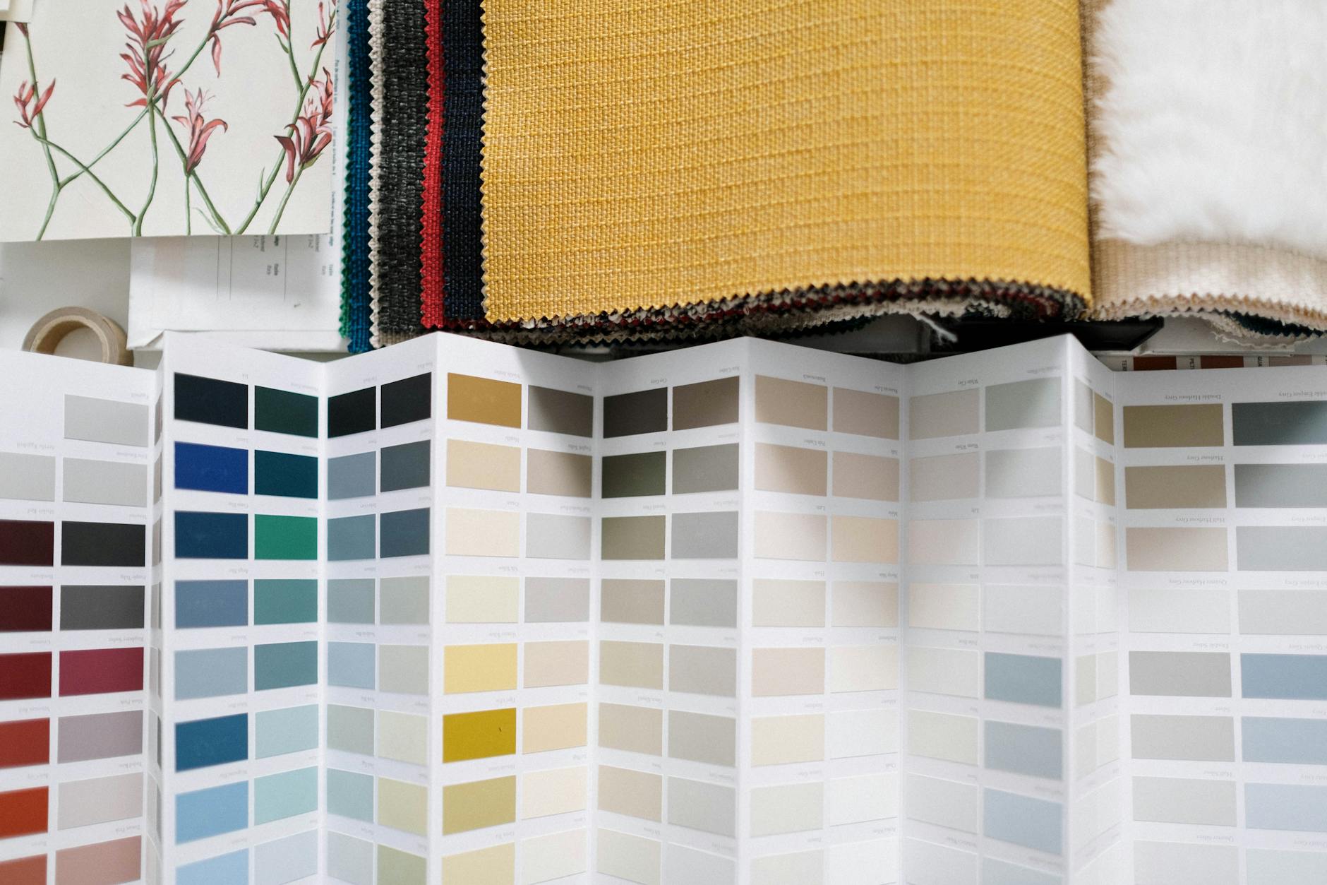 Colorful fabric swatches and samples displayed for suit customization