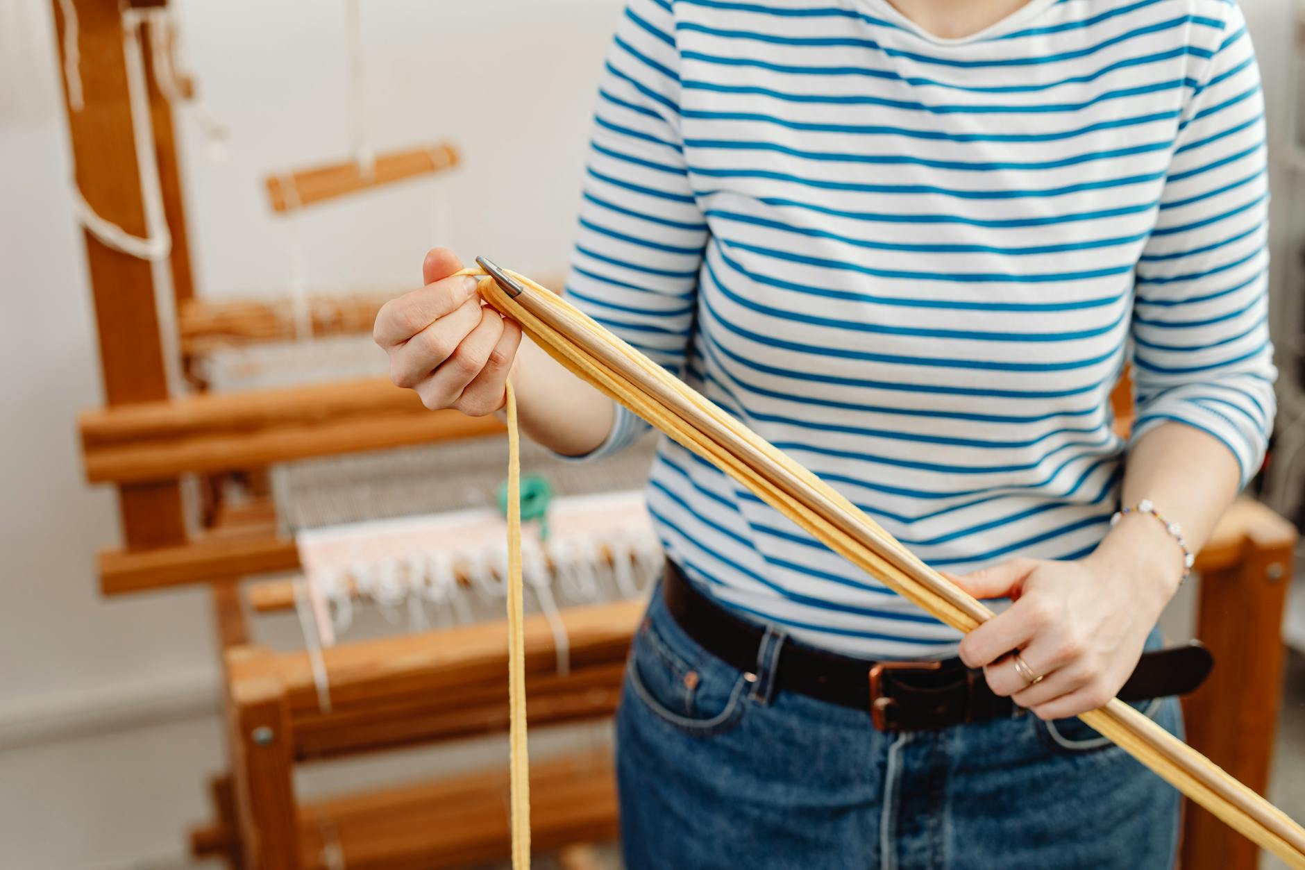 Traditional textile workshop with looms and manufacturing equipment