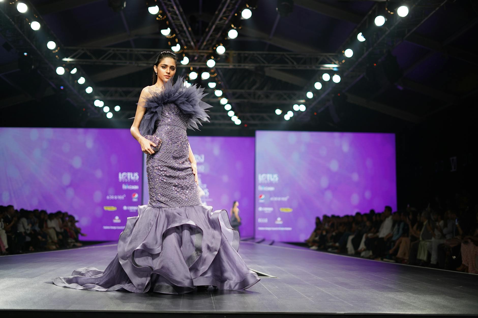 Fashion week venue with people attending shows