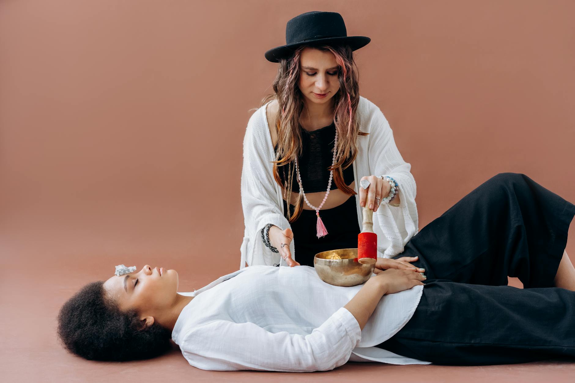 Crystal singing bowls used for sound therapy during wellness treatments