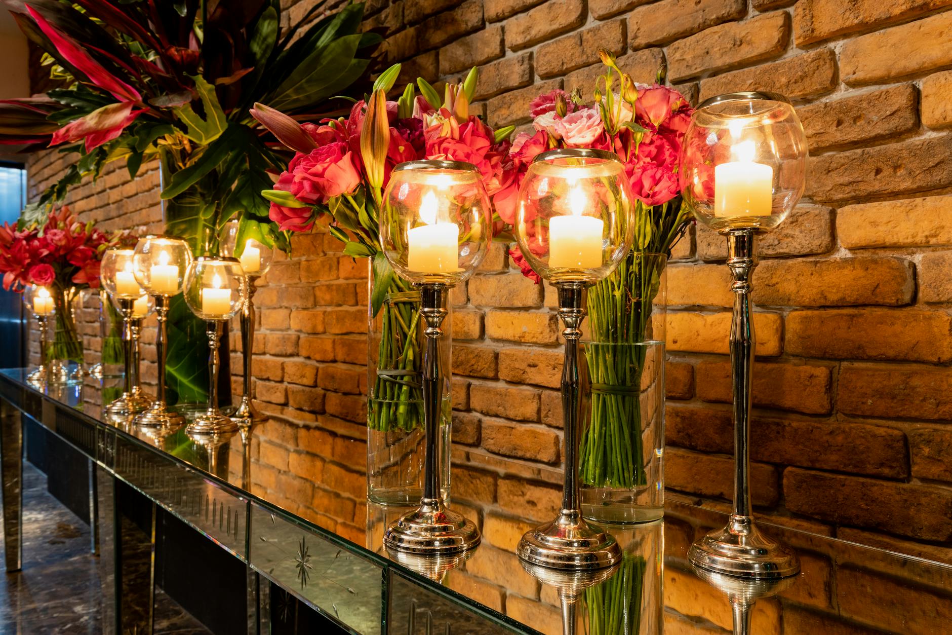 Sustainable wedding table setting with alternative floral arrangements and ambient lighting