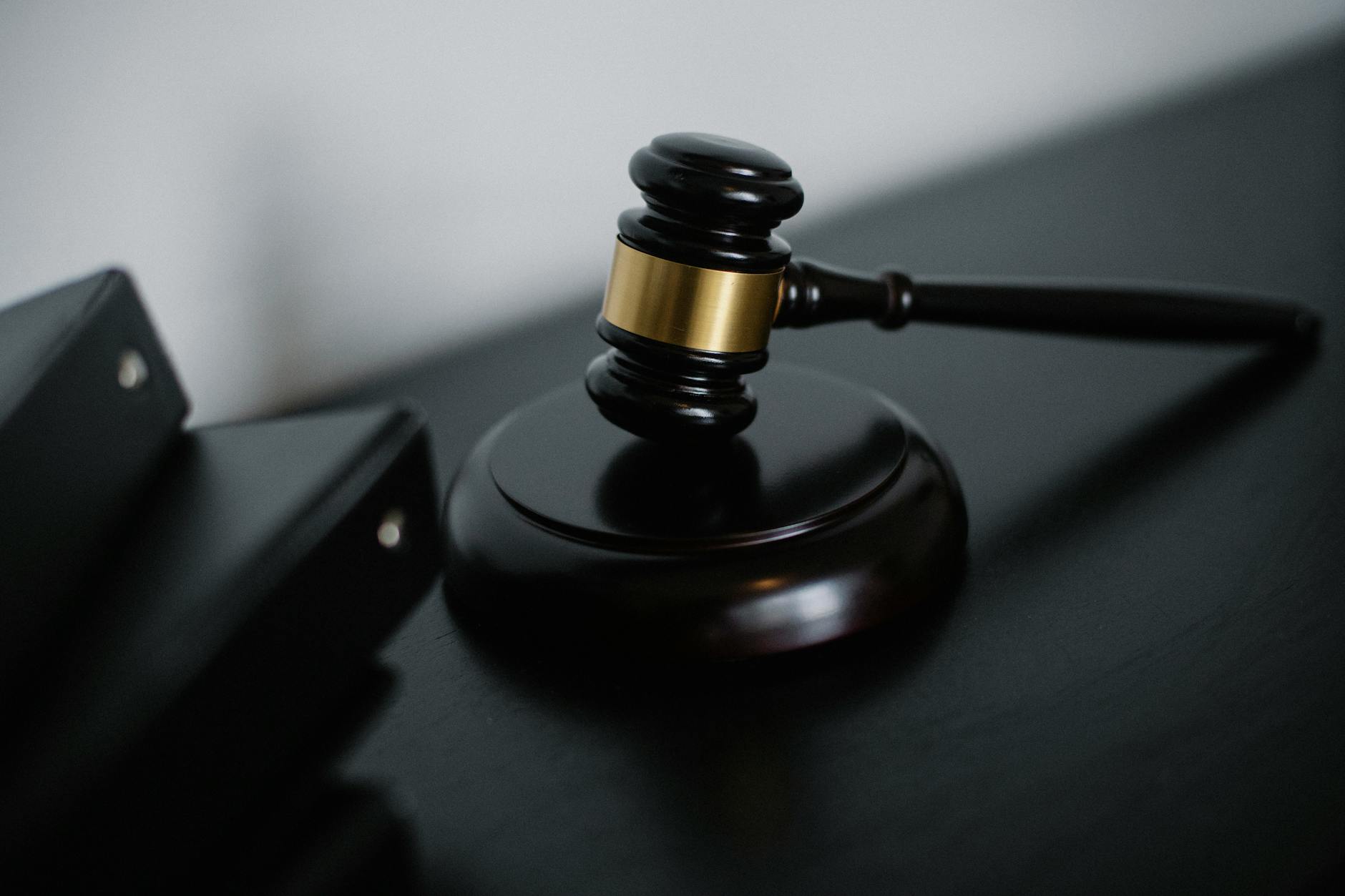 Auction gavel on wooden surface representing collectible sales and investment markets