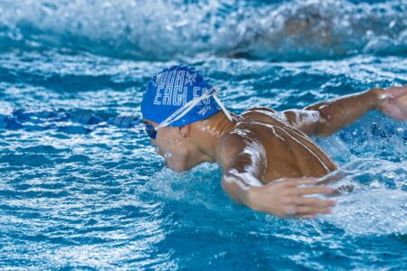 Water Polo Caps Are Creeping Into Luxury Accessories Editorials Close-up of a brightly colored water polo cap with ear guards and chin strap