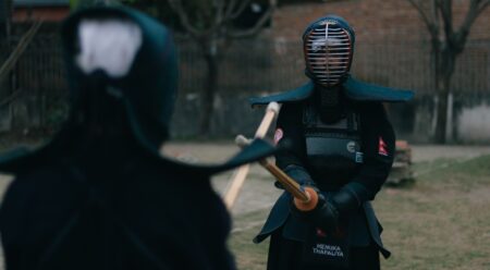 Traditional Japanese kendo bogu armour displayed showing segmented chest plate and lacing detail