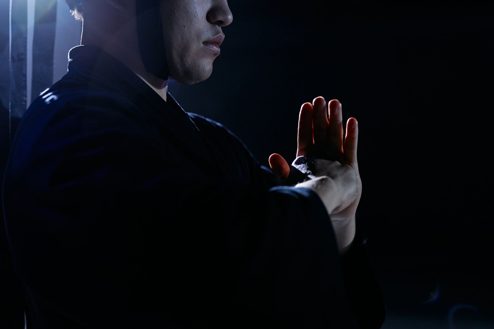Traditional kendo practitioner wearing tare hip apron and hakama during training