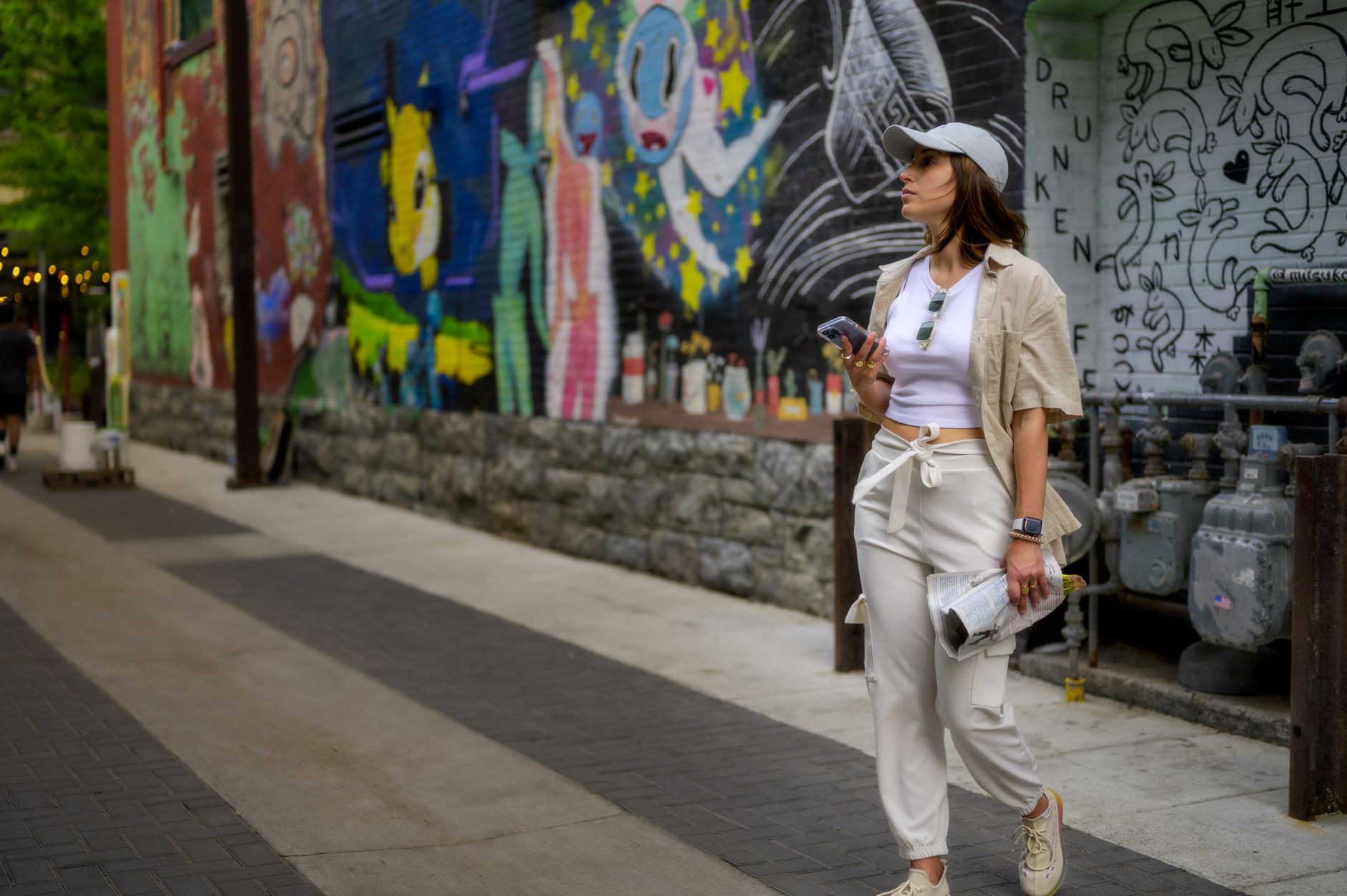 Casual everyday outfit with heritage-inspired accessories on a city street