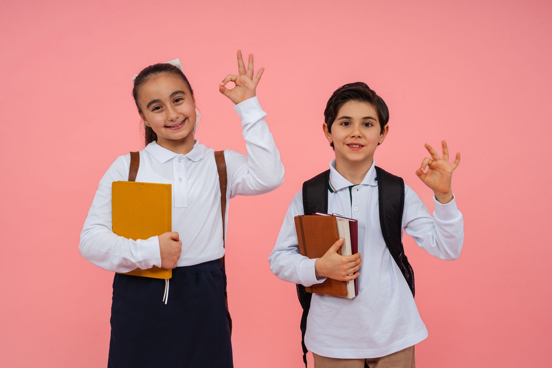 Classic British school uniform detail showing structured legwear and formal shoes