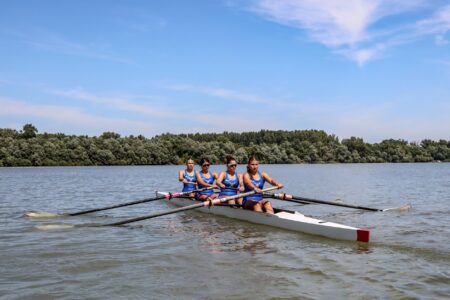 Eton College Rowing Shorts Are Quietly Shaping Tailored Swim Silhouettes Close-up of structured athletic rowing shorts showing waistband and seam construction