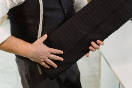 Polo Club Saddle Seat Welting Is Quietly Seaming Into Tailored Trouser Rises Close-up of tailored trouser rise seam construction showing precise stitching and fabric detail