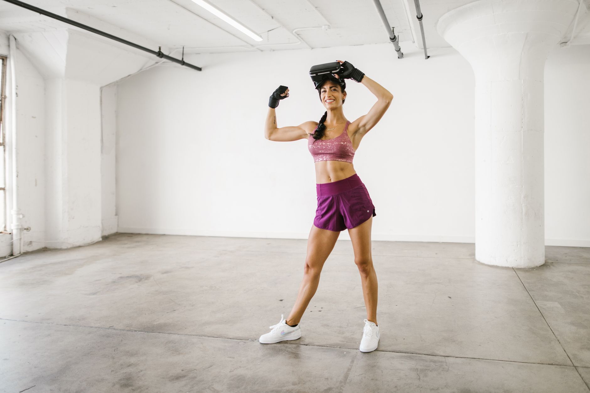 Woman wearing premium athleisure leggings with a structured waistband detail